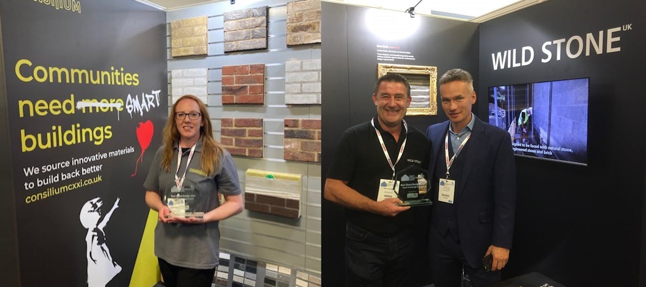 Photos of the Consilium group team with their awards for the best stand at Kent Construction Expo