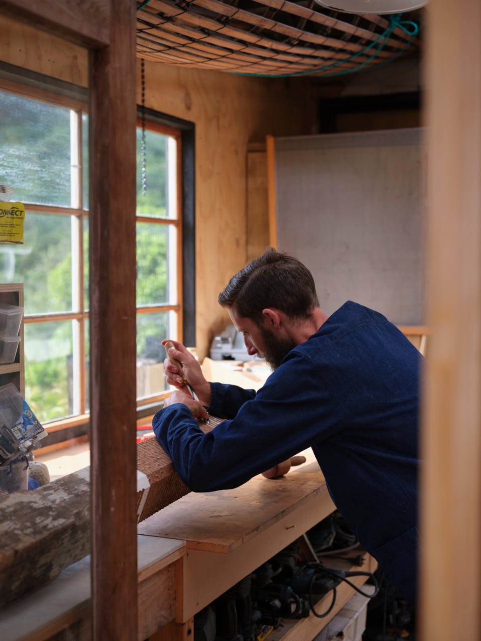 Tim Wernham in his woodworking studio. 
