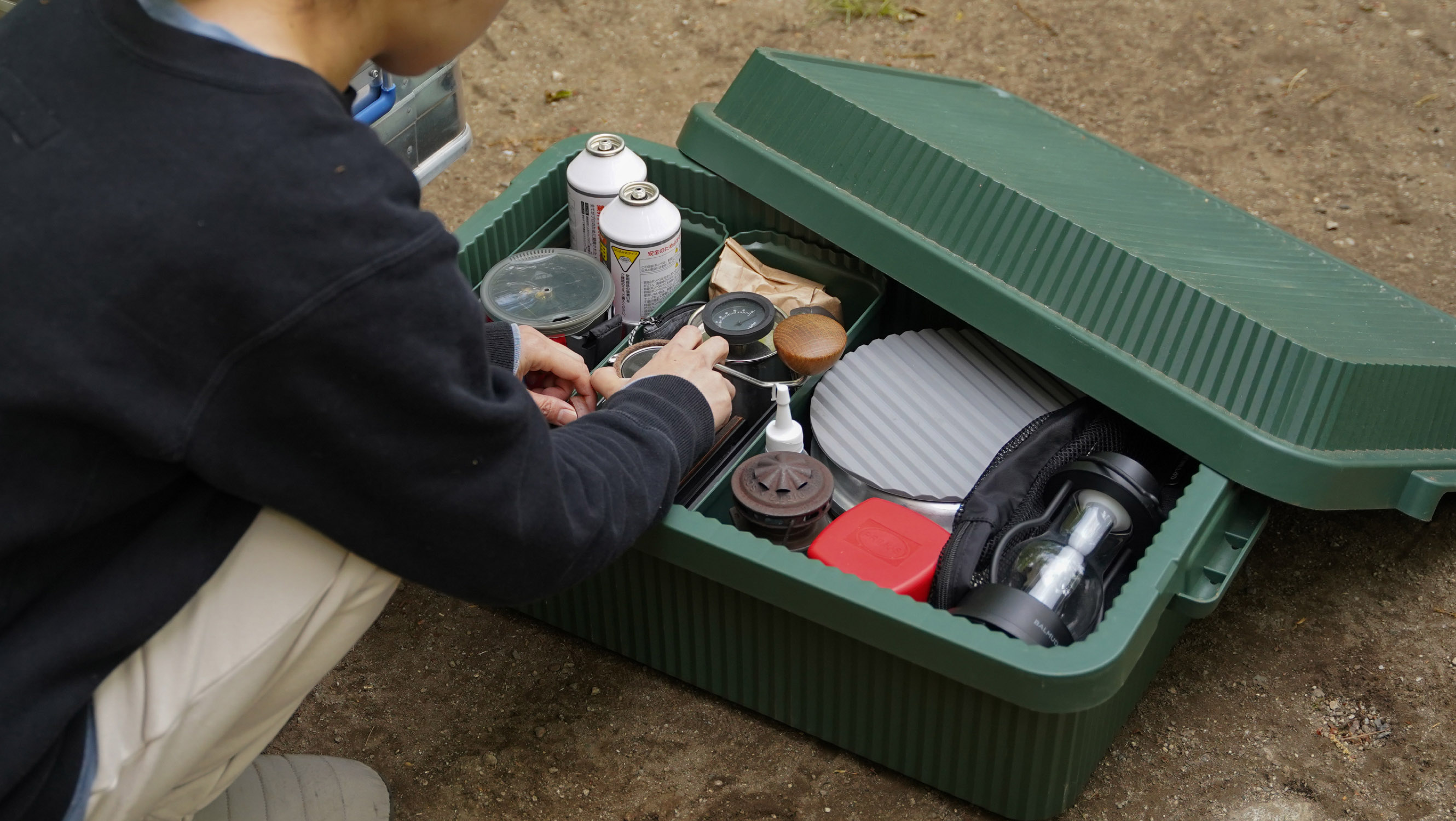 like-it Stack-Up Storage Containers with Inserts used to hold camping gear outdoors