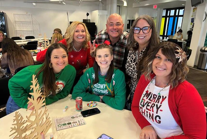 Employees of The Container Store enjoying a holiday celebration