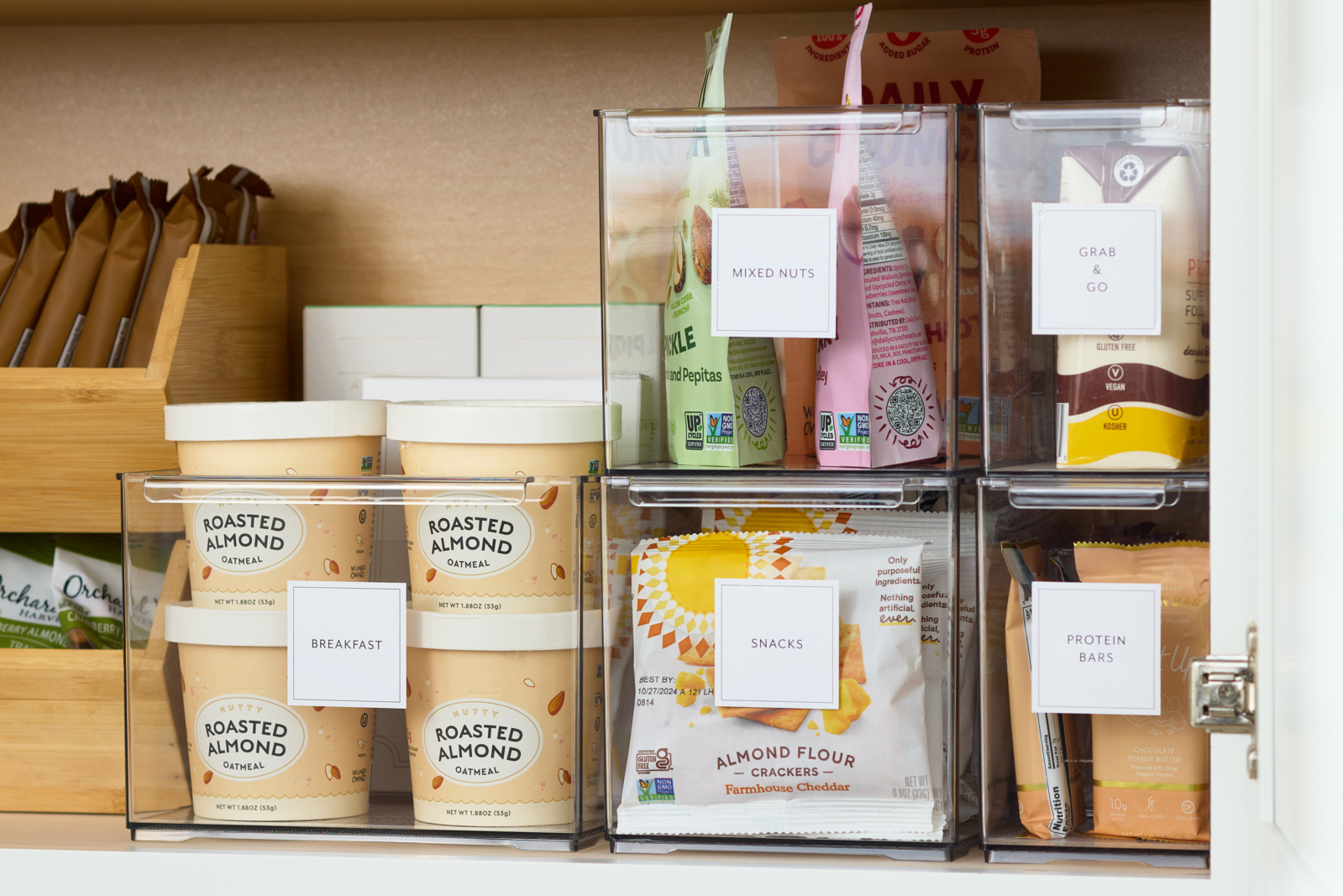 Everything Organizer Pantry Bins inside of an organized pantry cabinet