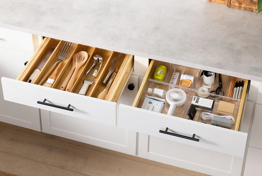 An organized kitchen utensil and junk drawer