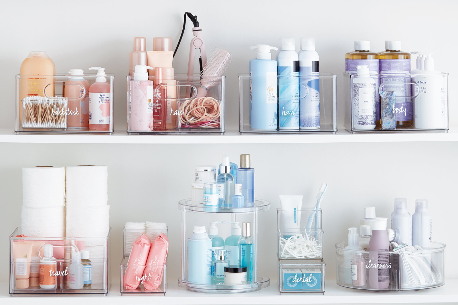 Organized laundry room with backstock bins for cleaning supplies