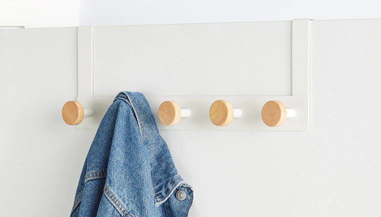 How to Organize Your College Dorm Room with Hooks and Risers