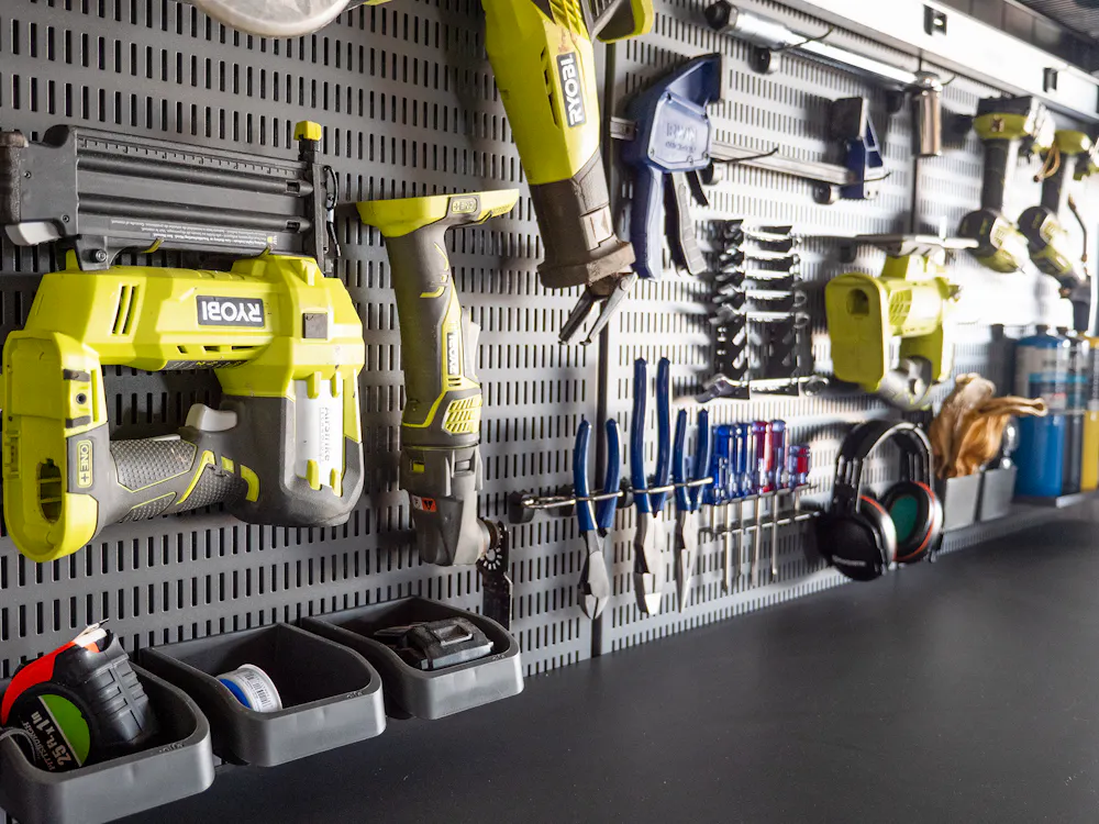Ashley Smith's Garage+ by Elfa pegboard filled with tools