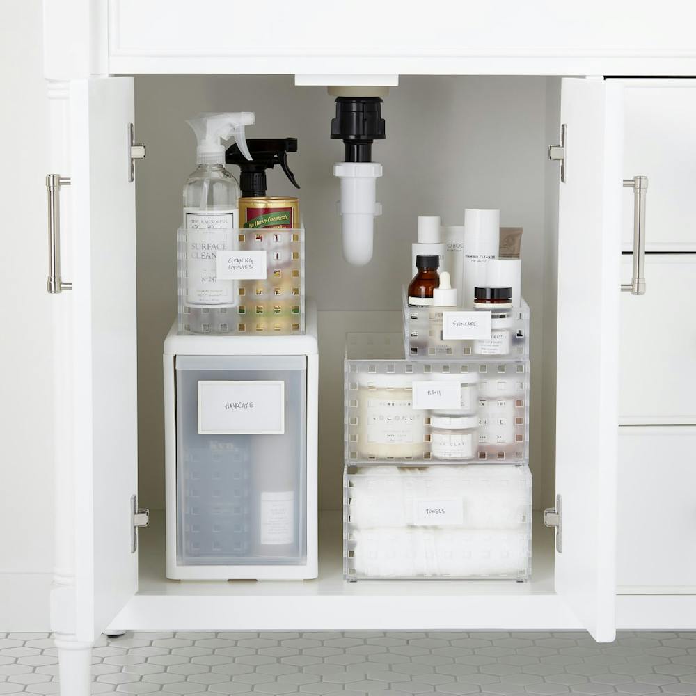 like-it Under The Sink Storage Kit storing cleaning products and toiletries under a bathroom sink