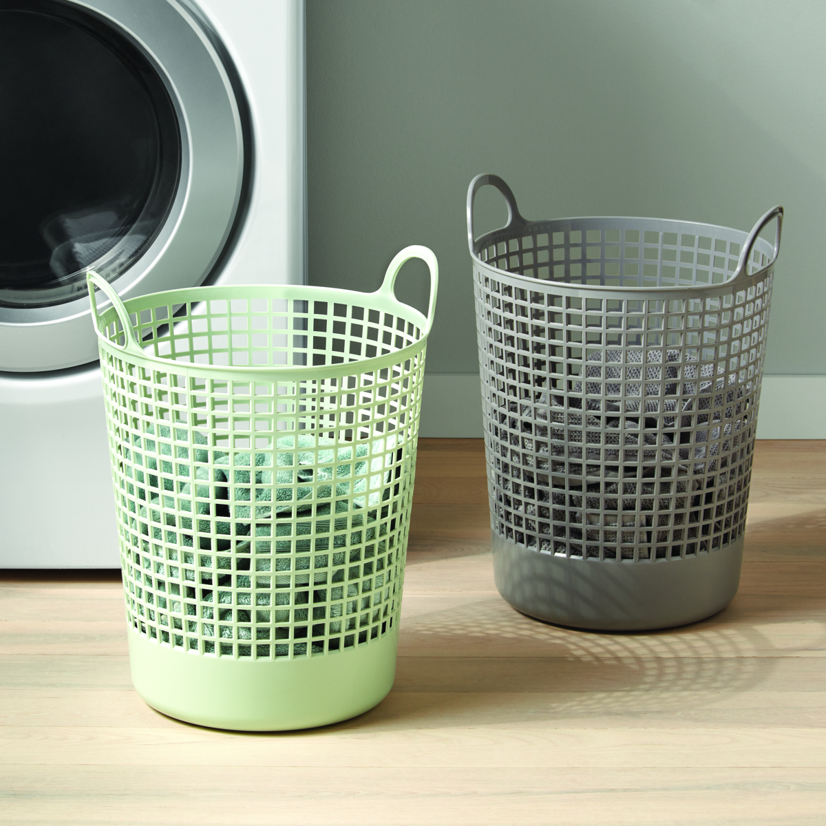 like-it Round Laundry Baskets storing dirty clothes in a laundry room