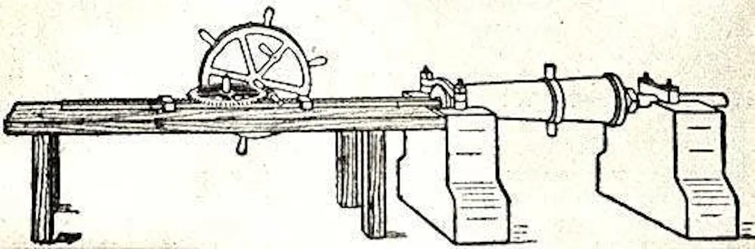 Engraving of an early industrial lathe with hand wheel and mounted workpiece