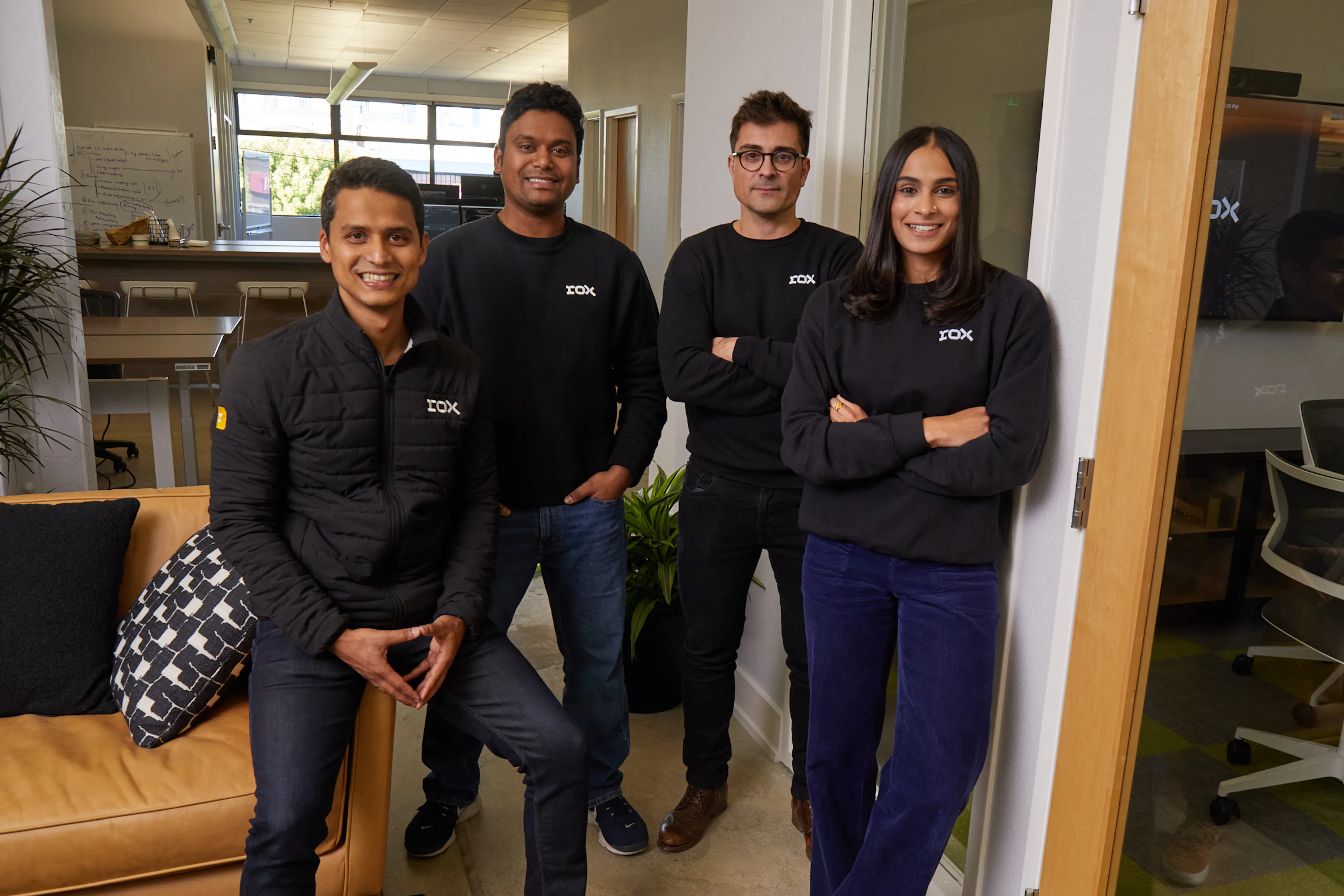 Four of Rox's co-founders, Ishan Mukherjee, Shriram Sridharan, Diogo Ribeiro, and Avanika Narayan, standing together in an office