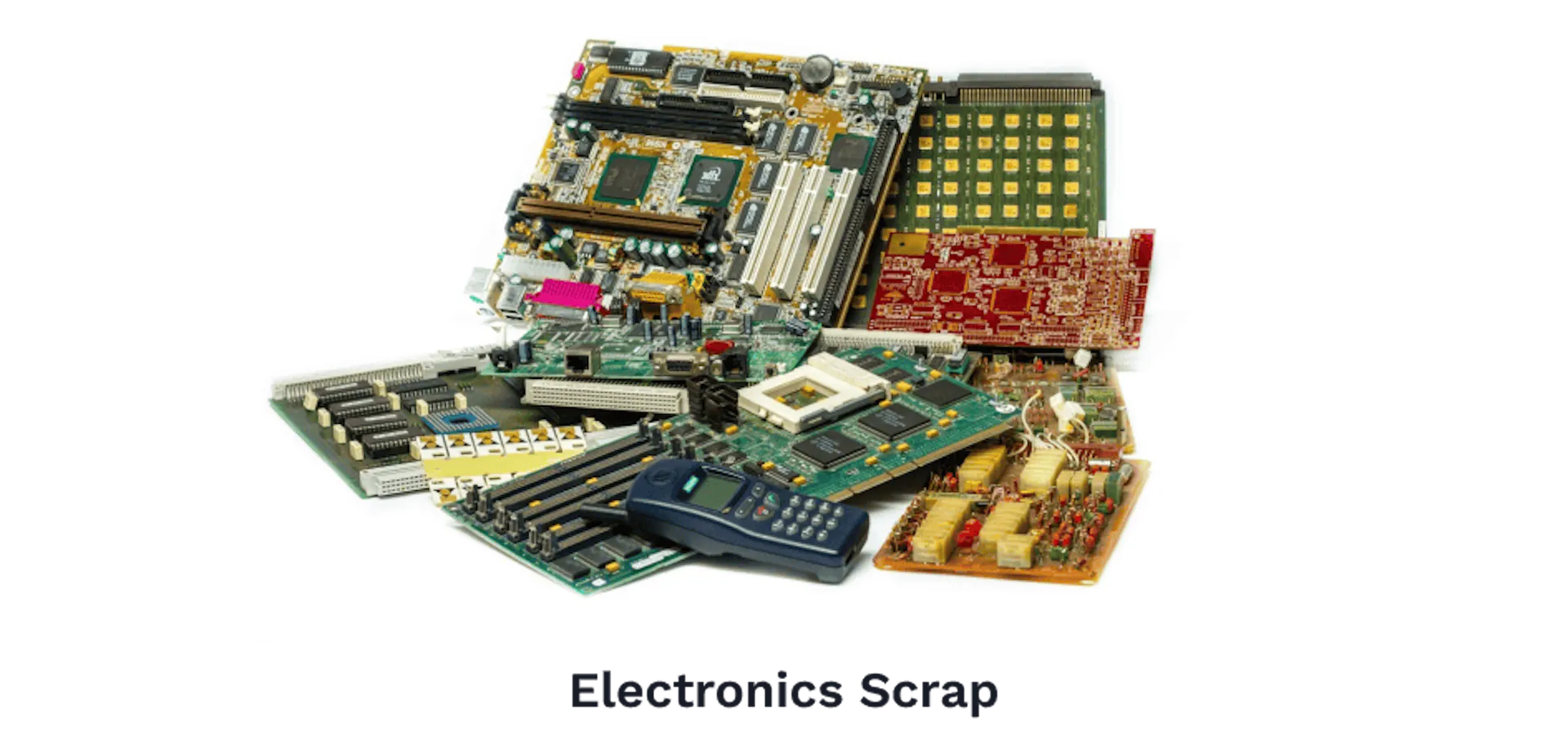 Photograph of electronics scrap, circuit boards and components piled together