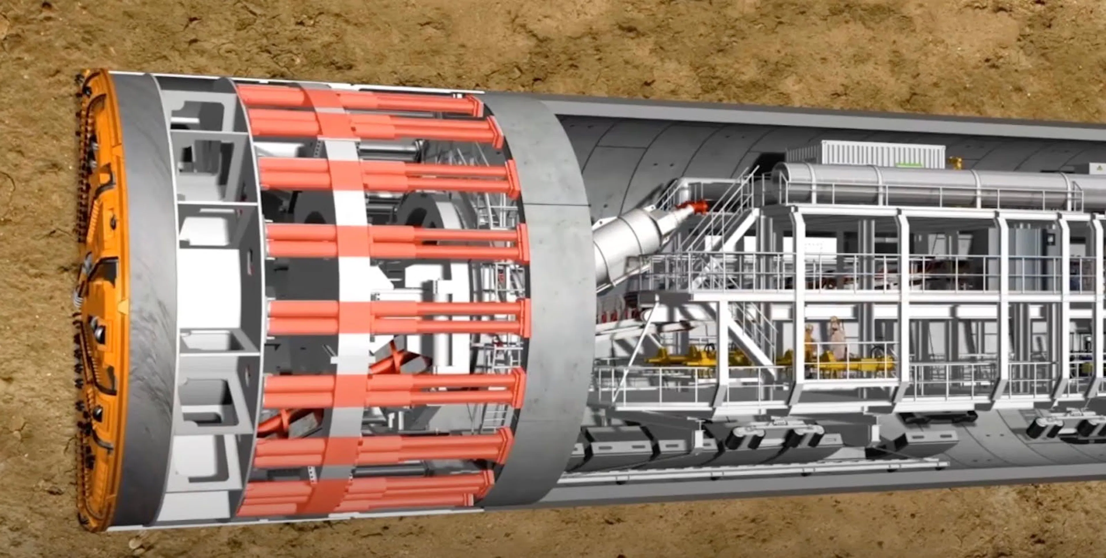Cutaway rendering of a modern tunnel boring machine underground, cutter head at the face and trailing gantries behind