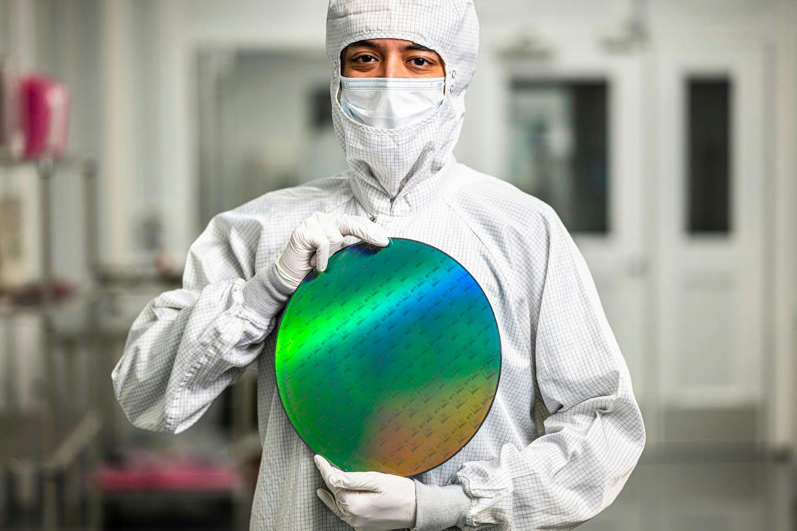 Person holding an Omega chipset