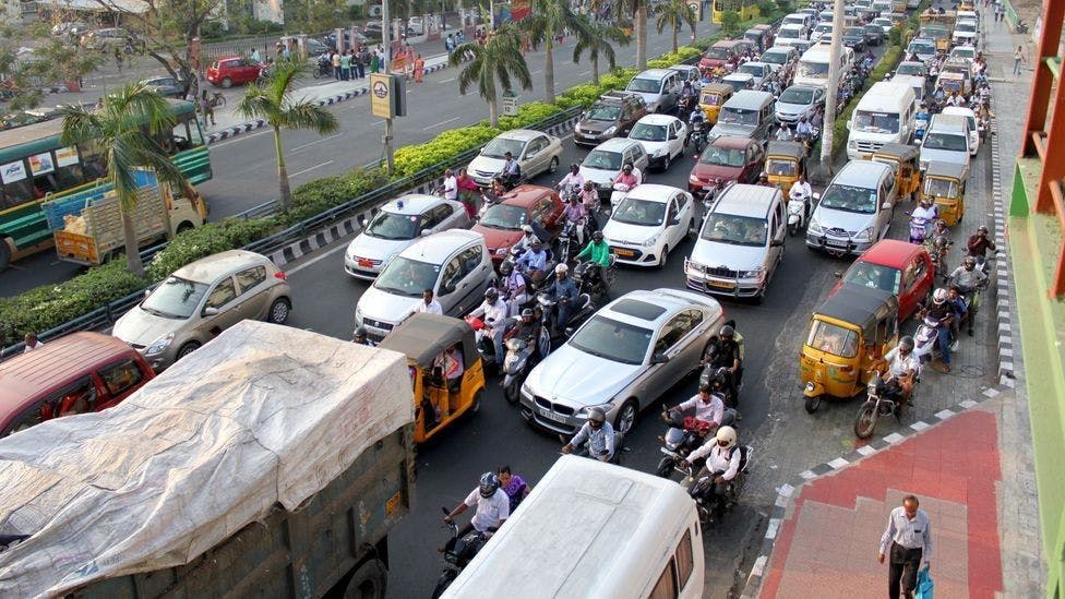 Chaotic street in a bustling overcrowded city in India