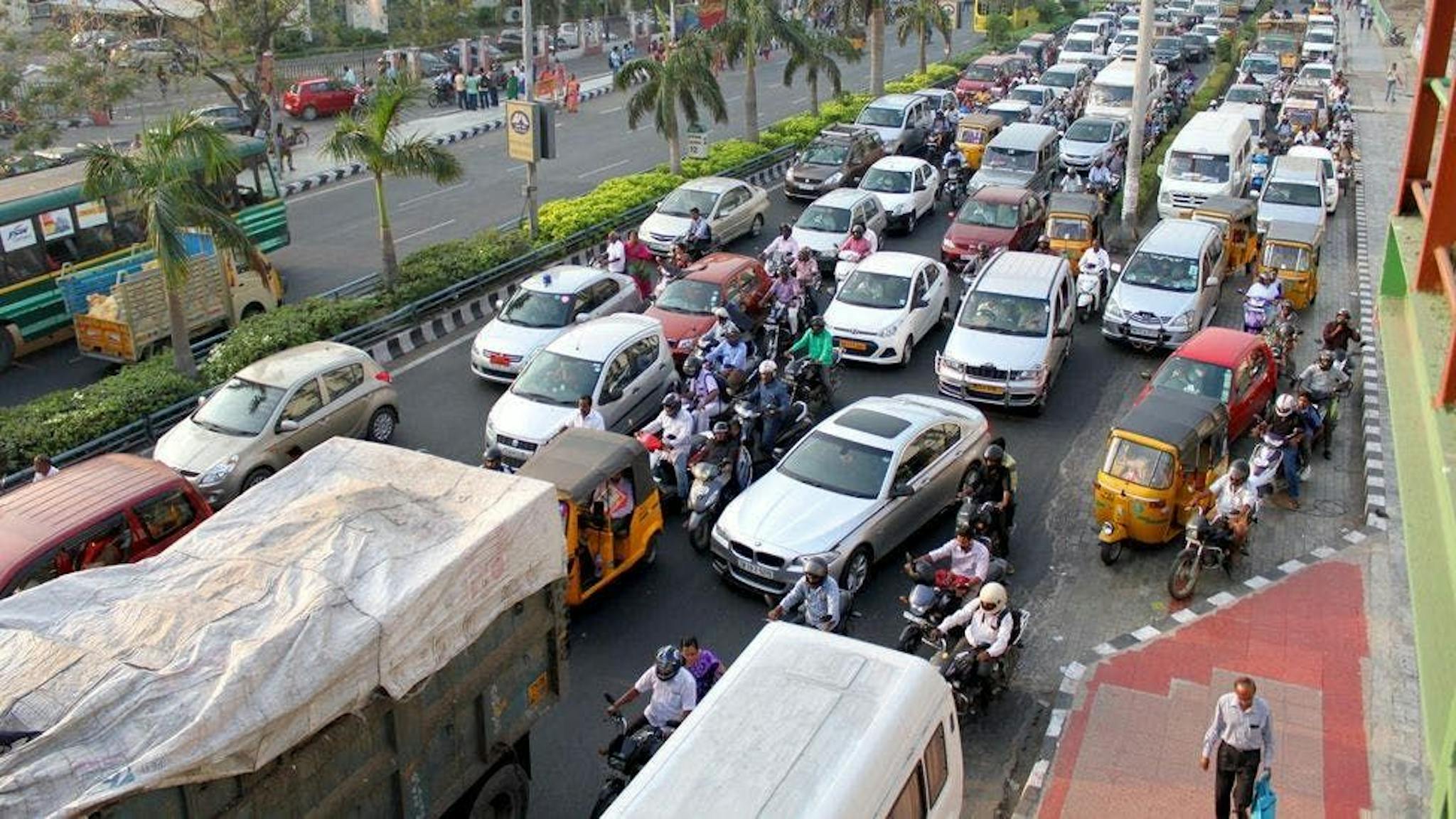 Chaotic street in a bustling overcrowded city in India