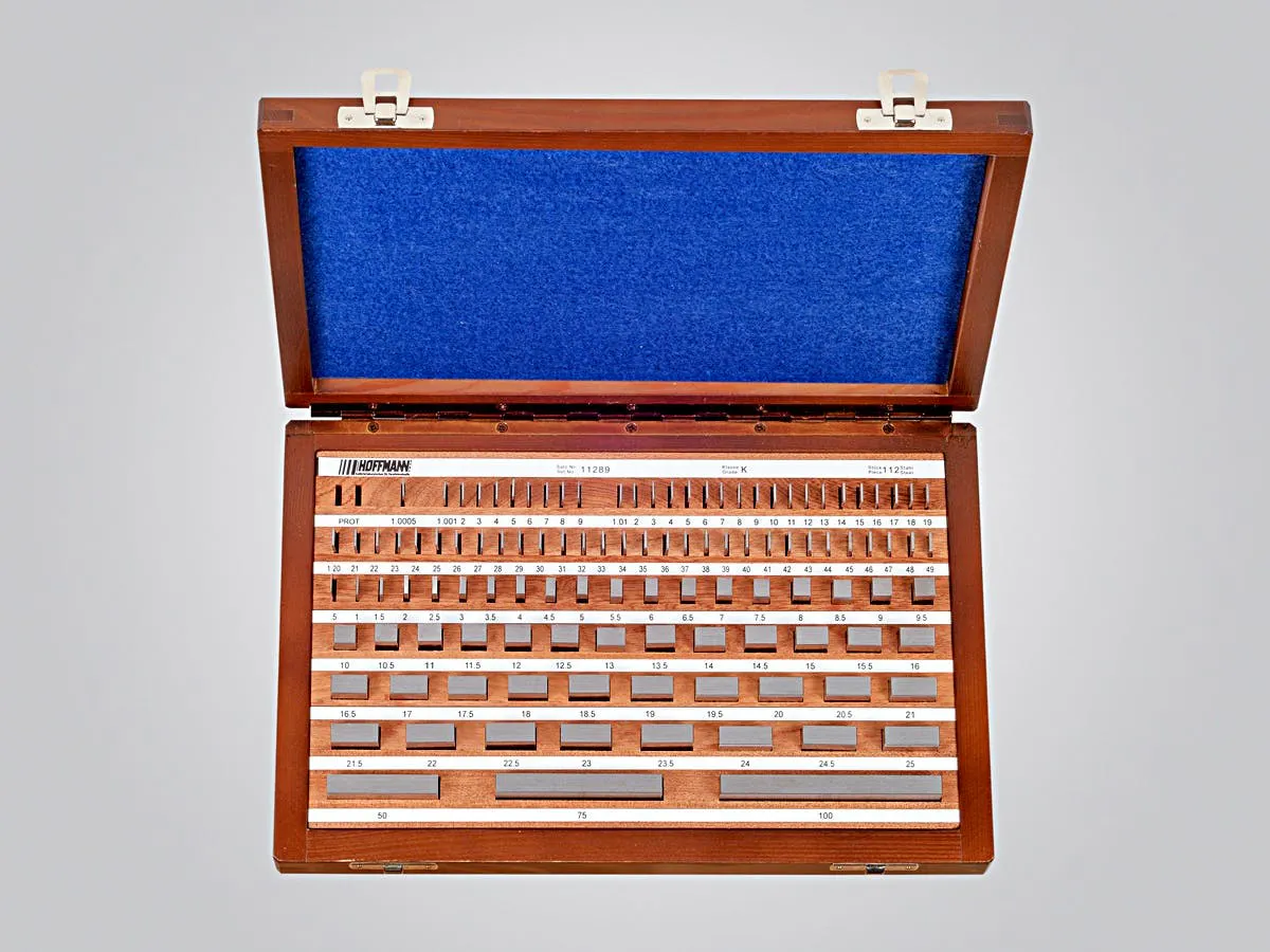 Photograph of a Johansson gauge block set in its fitted wooden case