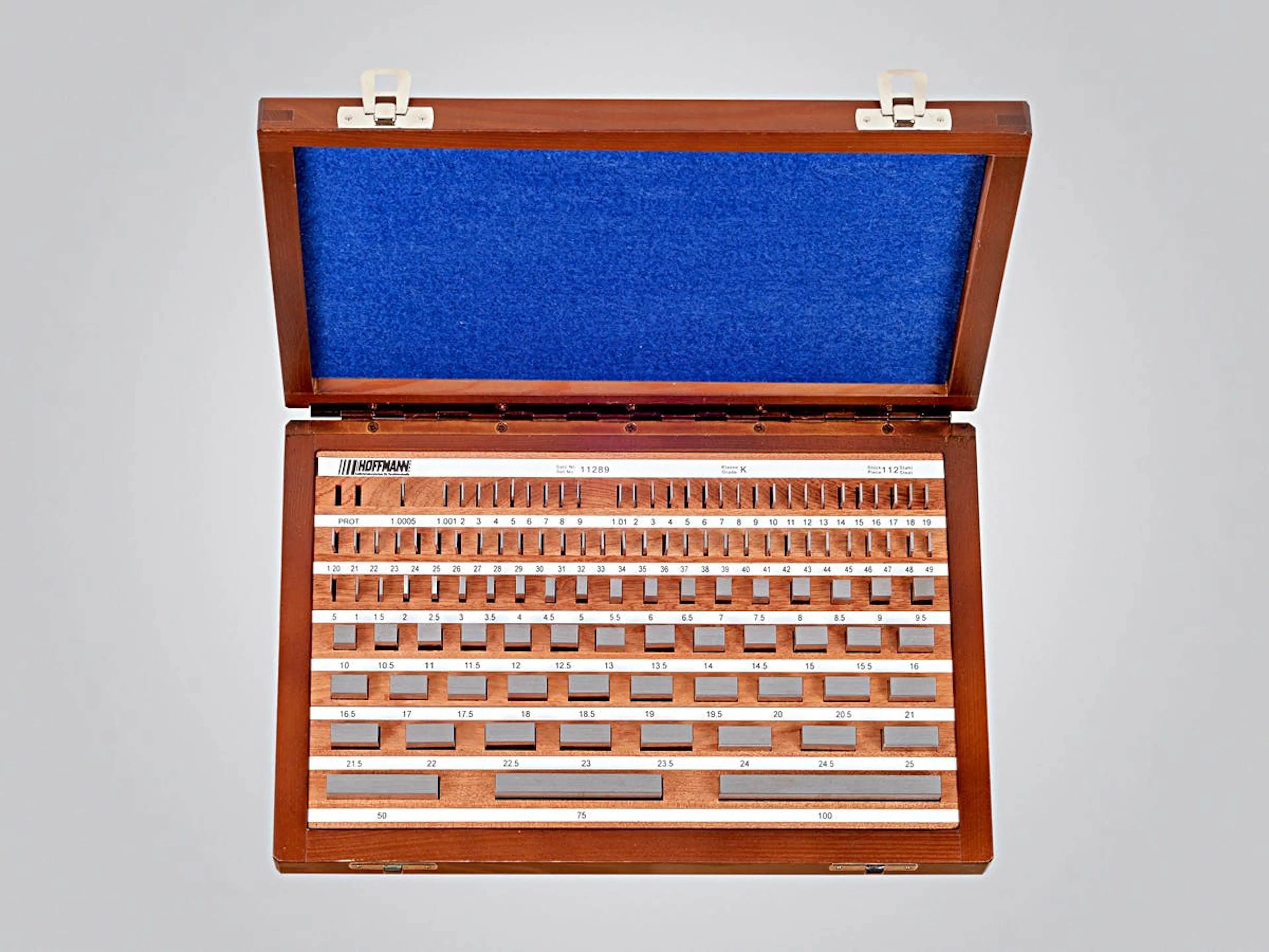 Photograph of a Johansson gauge block set in its fitted wooden case