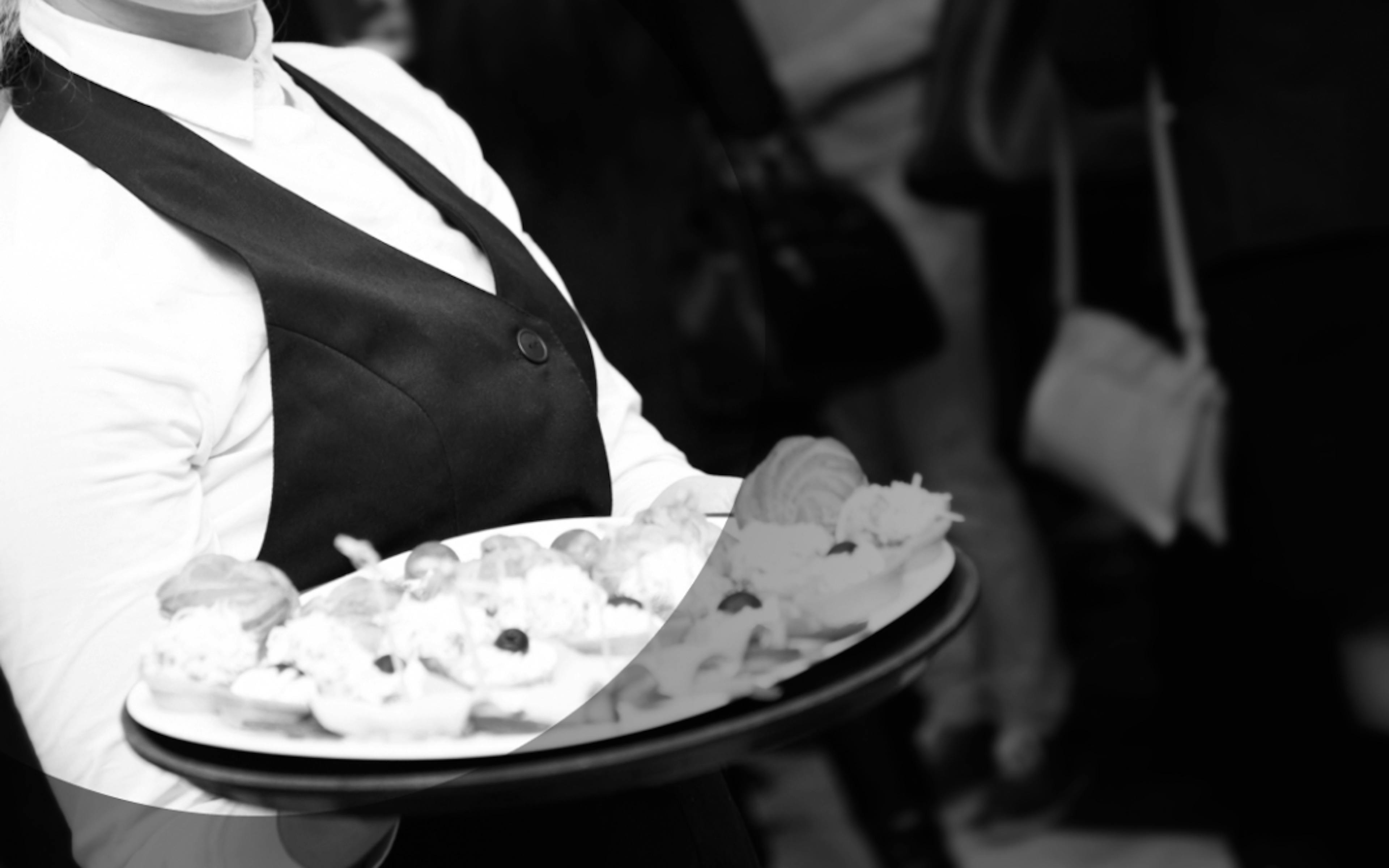 event staff serving food
