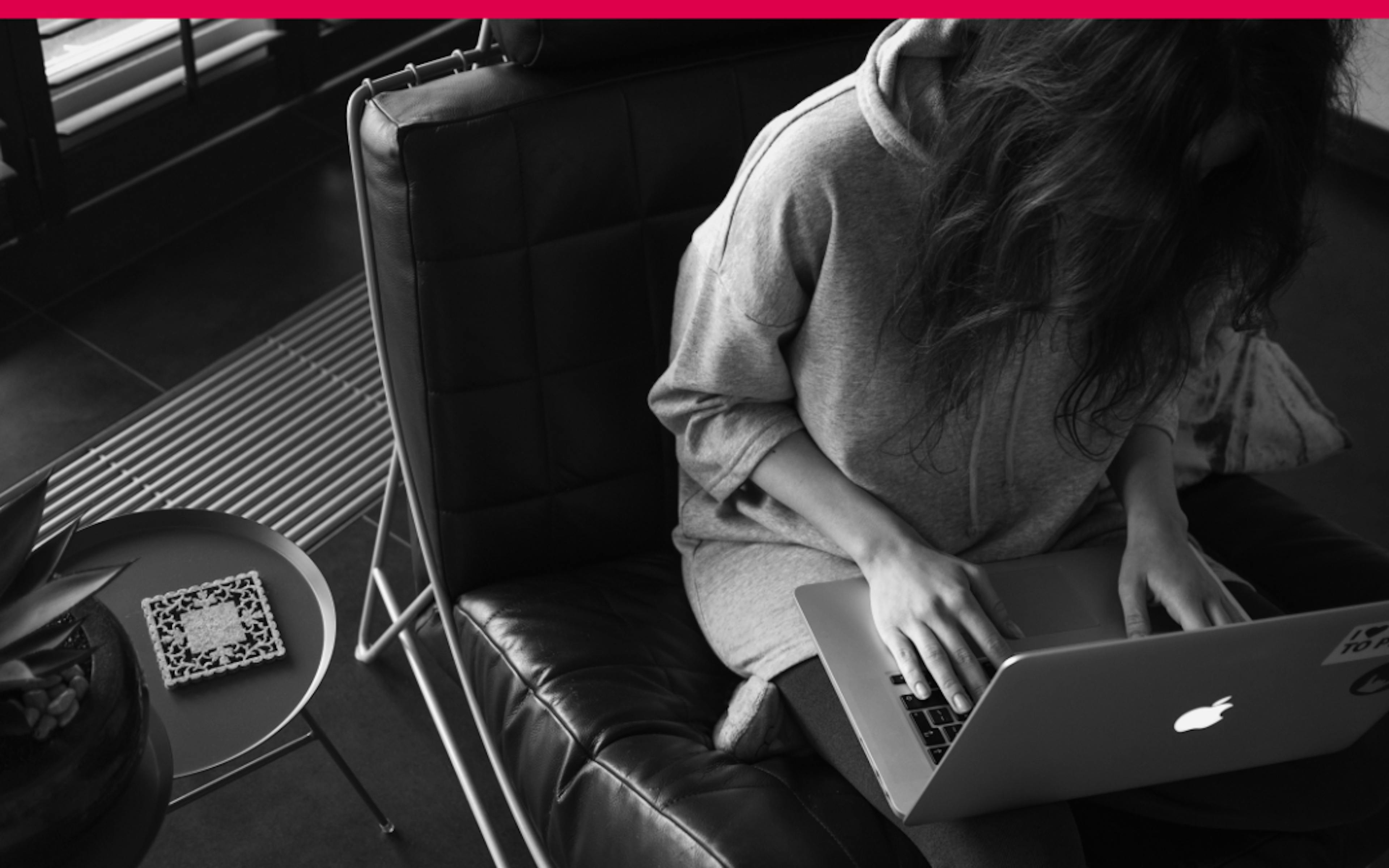 worker with laptop at desk