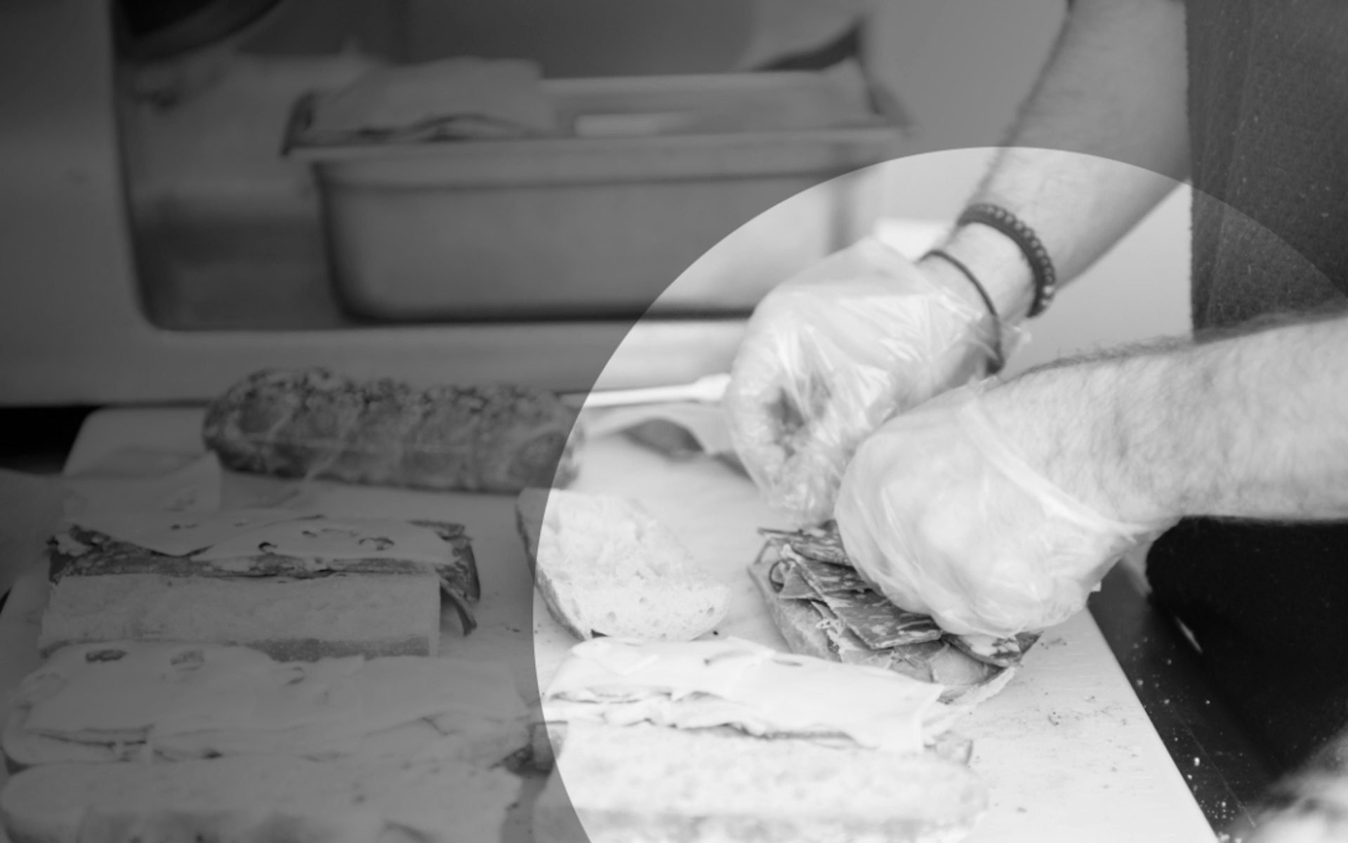 sandwich preparation by worker