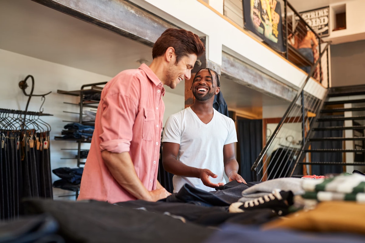 Two men working together in retail store