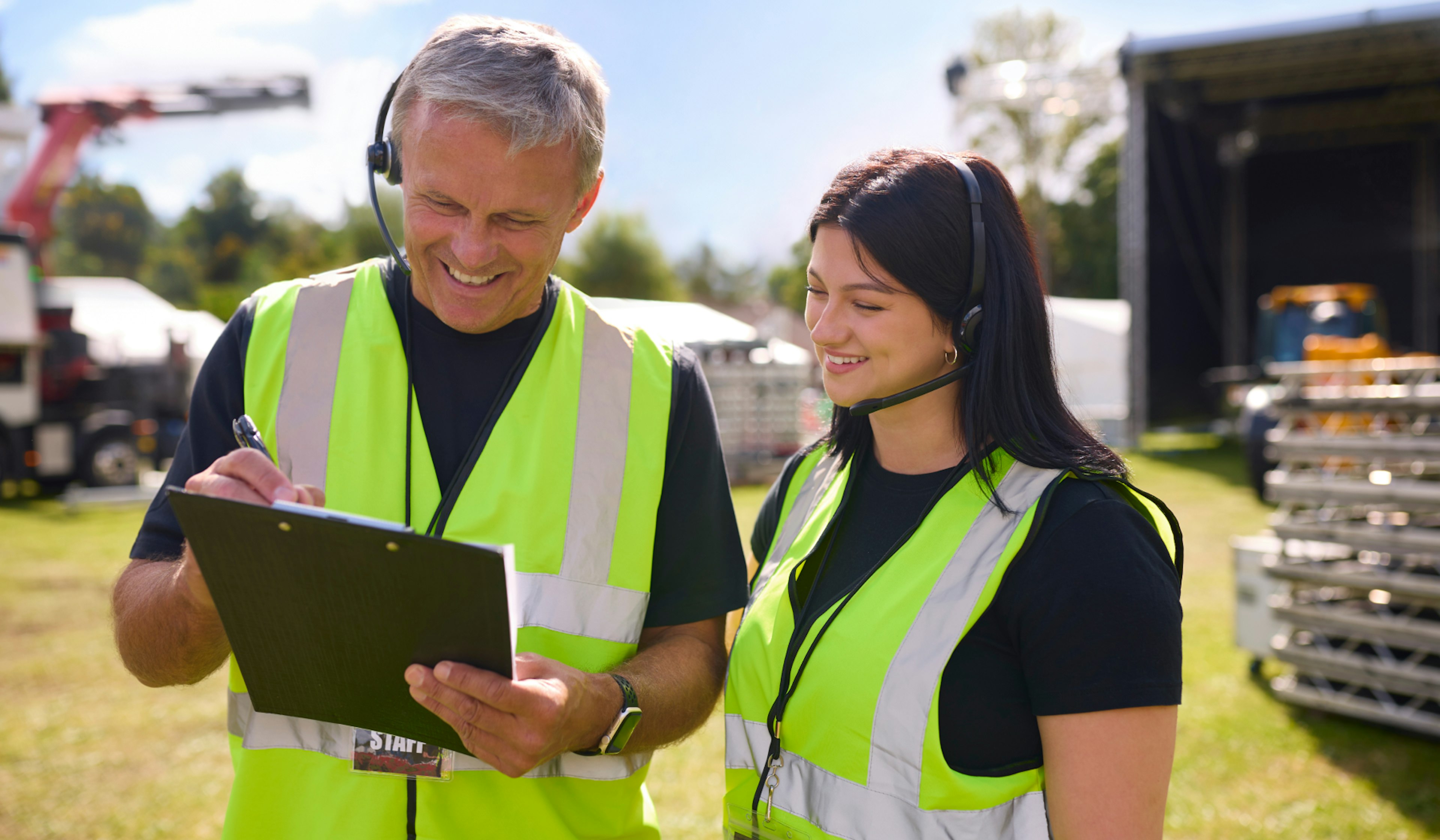 woman and men planning festival staffing