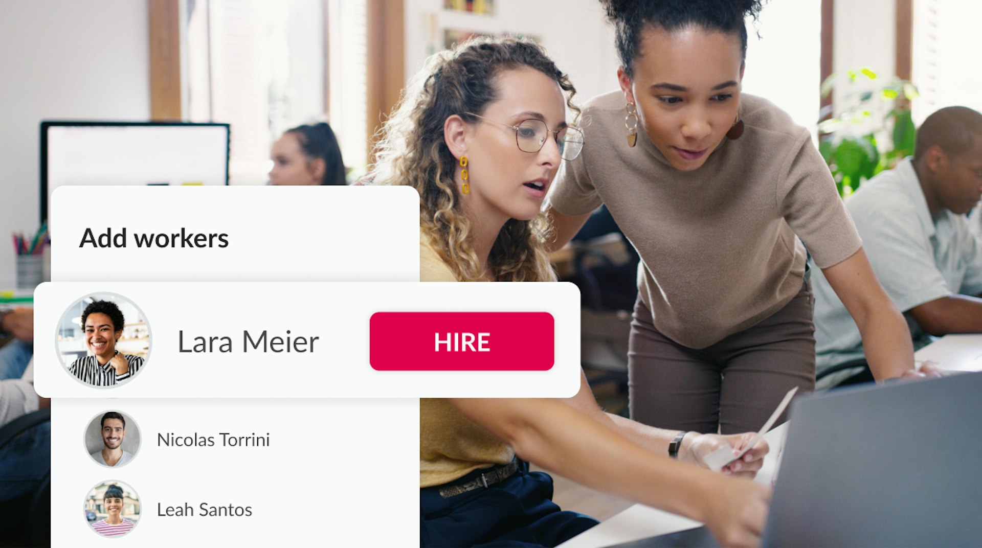 Two people discussion workforce management solutions