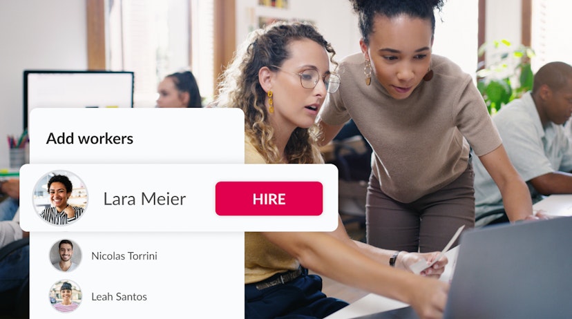 Two people discussion workforce management solutions