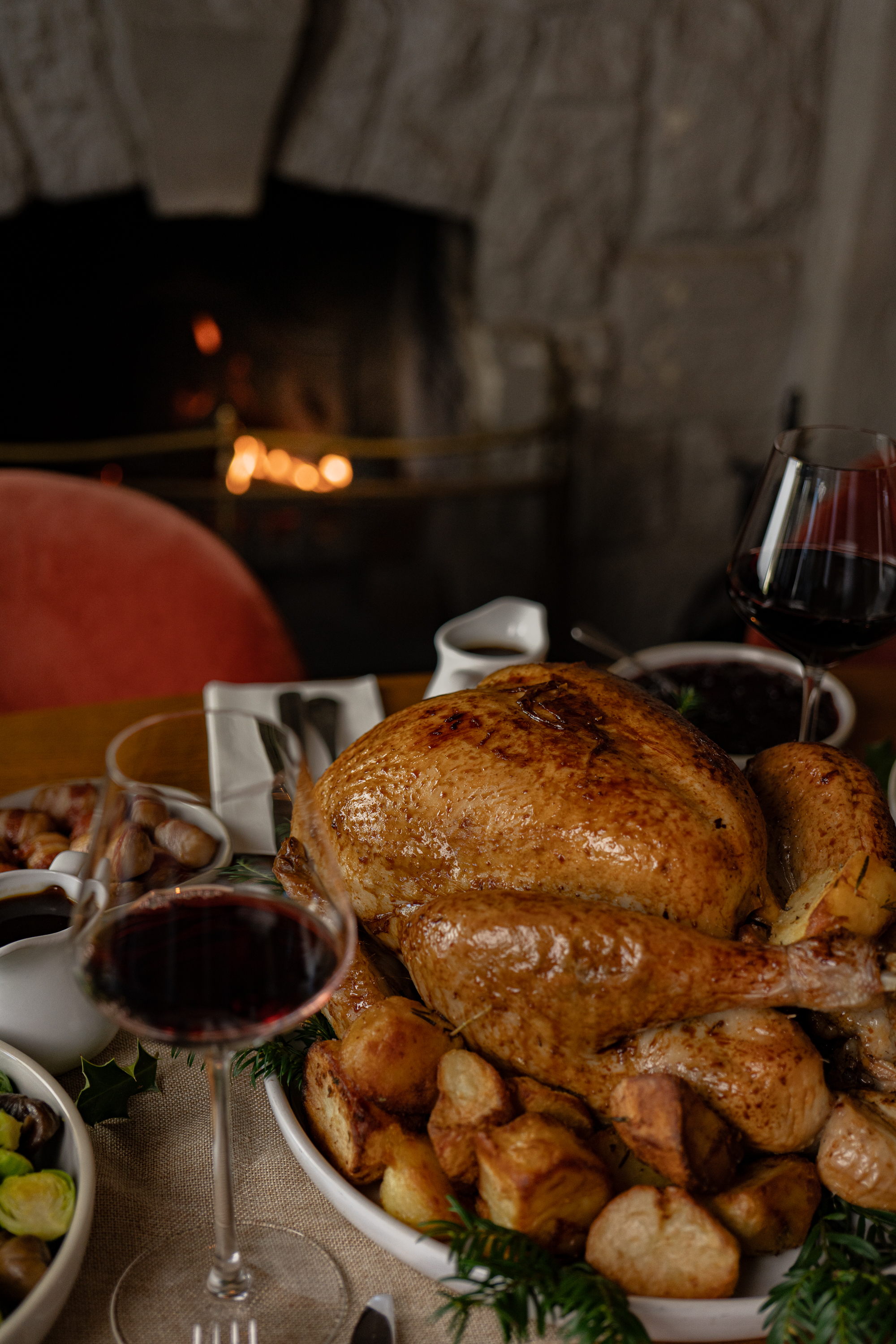 Festive table with turkey in the centre 