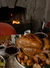 Festive table with turkey in the centre
