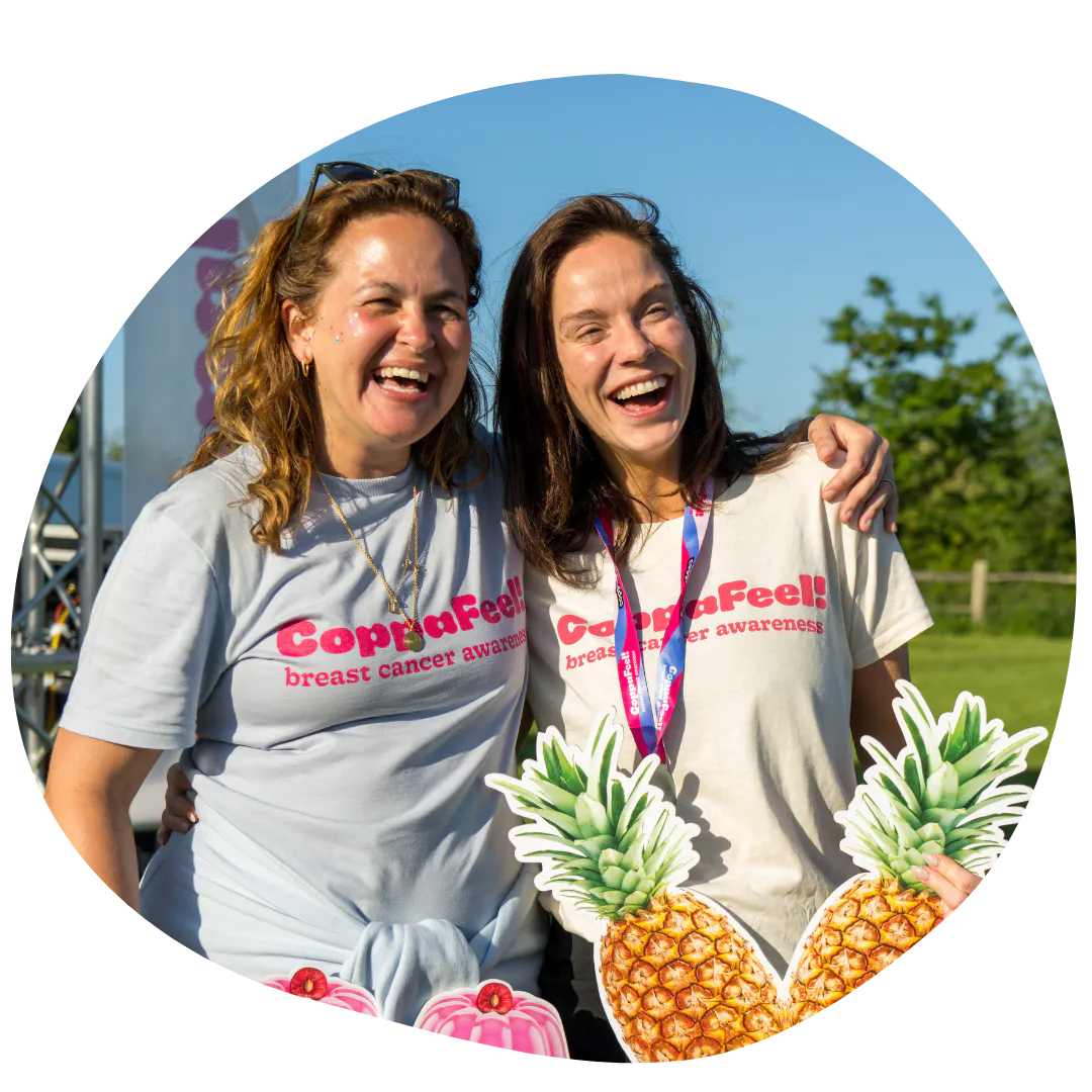 Celebrity guests hugging in CoppaFeel! t-shirts.