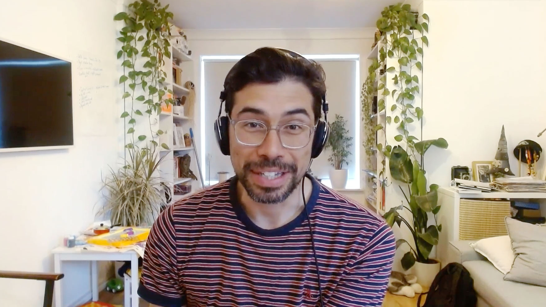 Man with glasses sit in front of computer