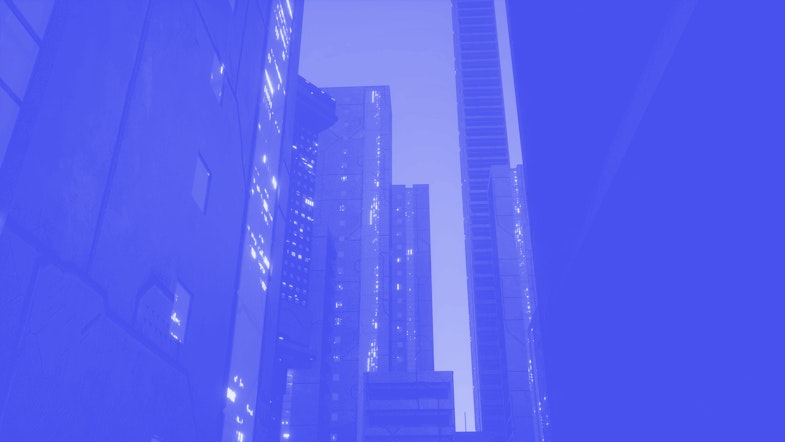 skyscrapers at night with a blue filter