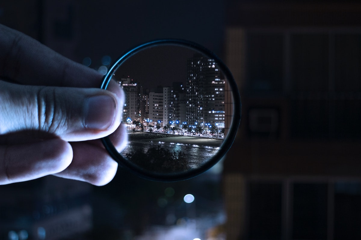 magnifying glass on city