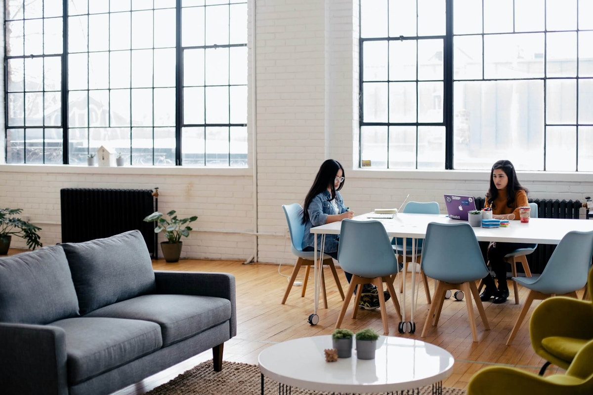 two women working on product intelligence