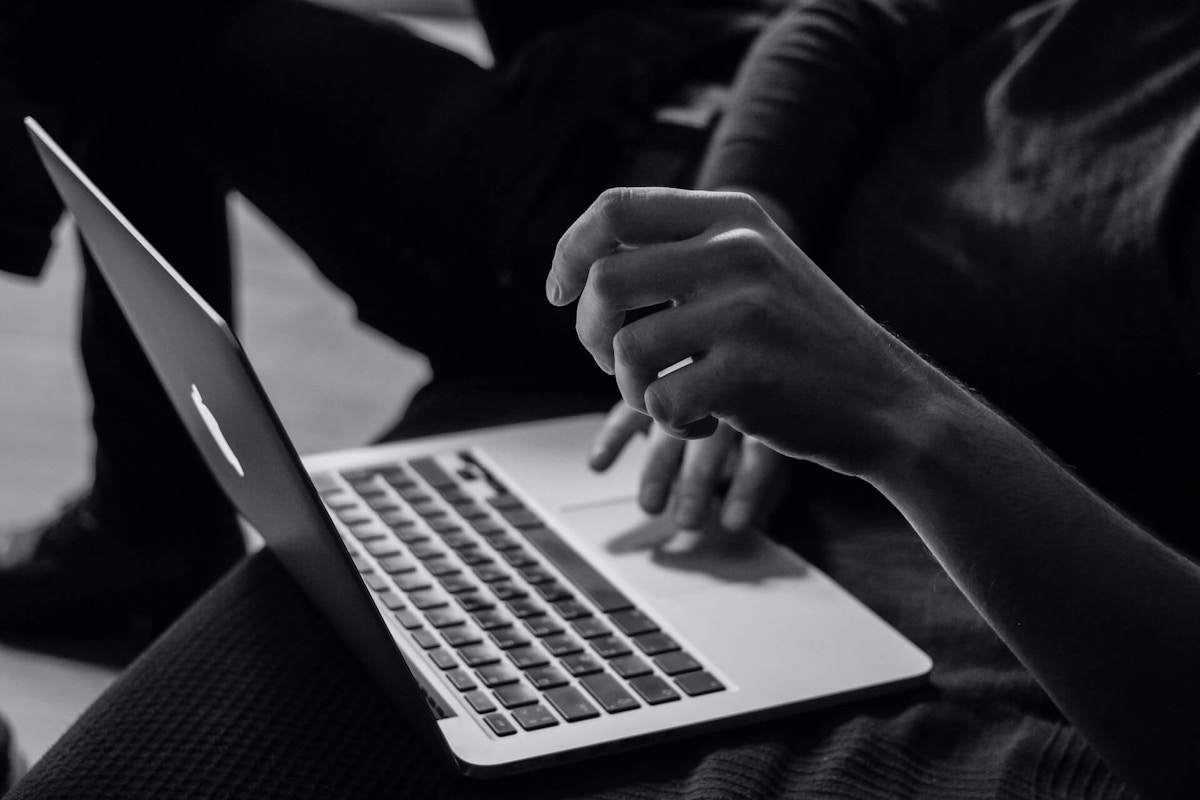 person working with a laptop