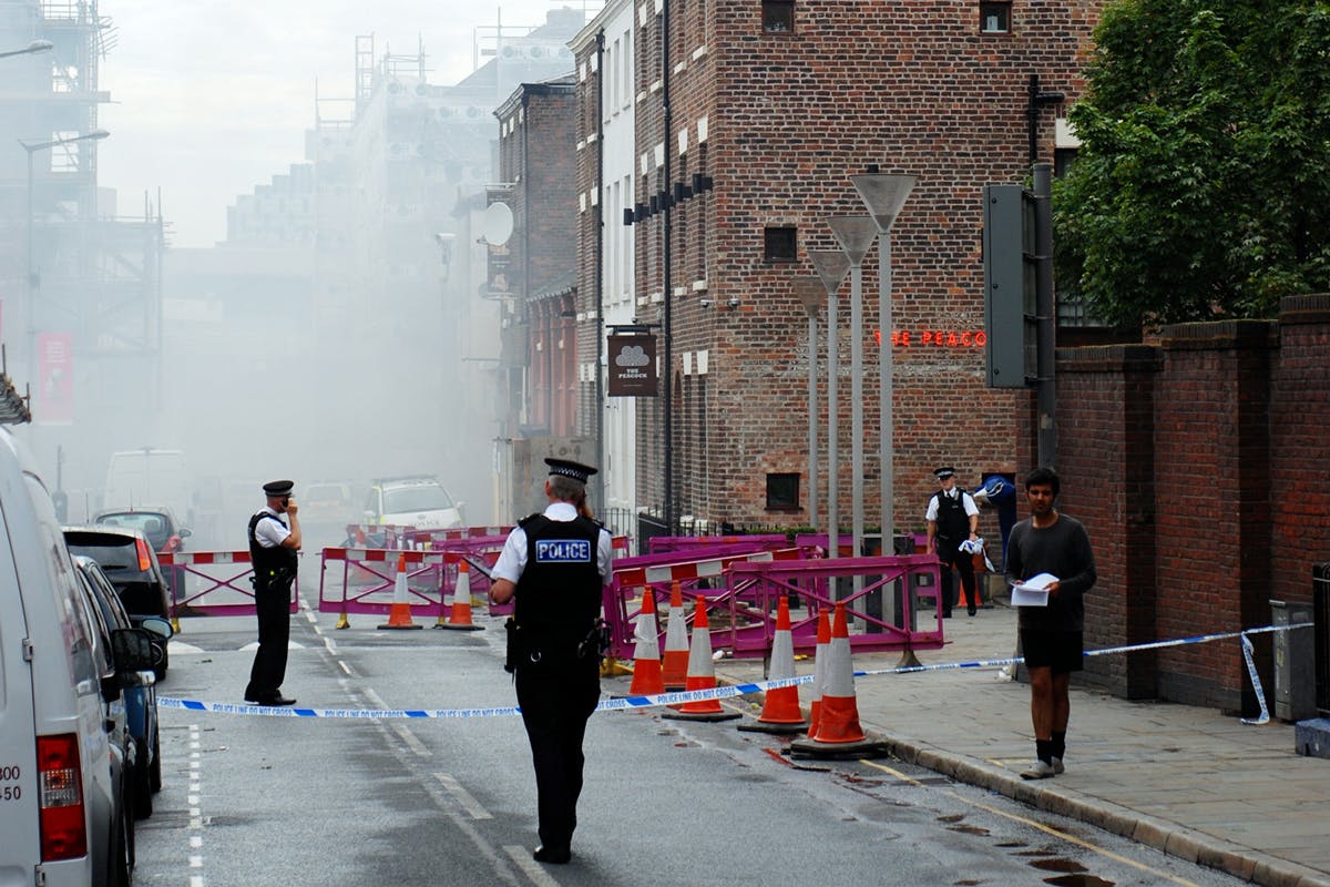 Police blocked off street in the city with traffic cones