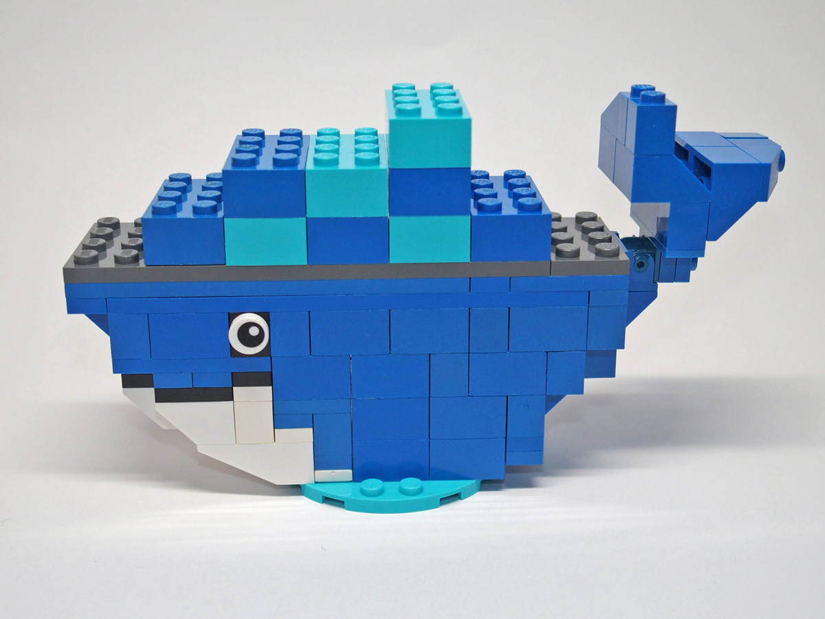 LEGO model of a blue whale symbolizing Docker in the context of software development and containerization
