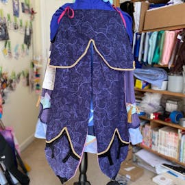 back view of qiqi costume from genshin impact for cosplaying