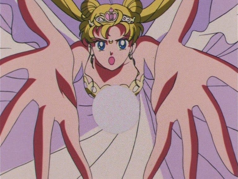 princess serenity holding her hands out in an attack