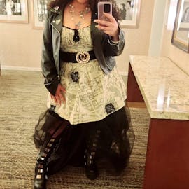 Bounded to the Harry Potter and the Cursed Child Show in a Marauder’s Map dress with Hufflepuff inspired pieces in a more punk rock fashion. 