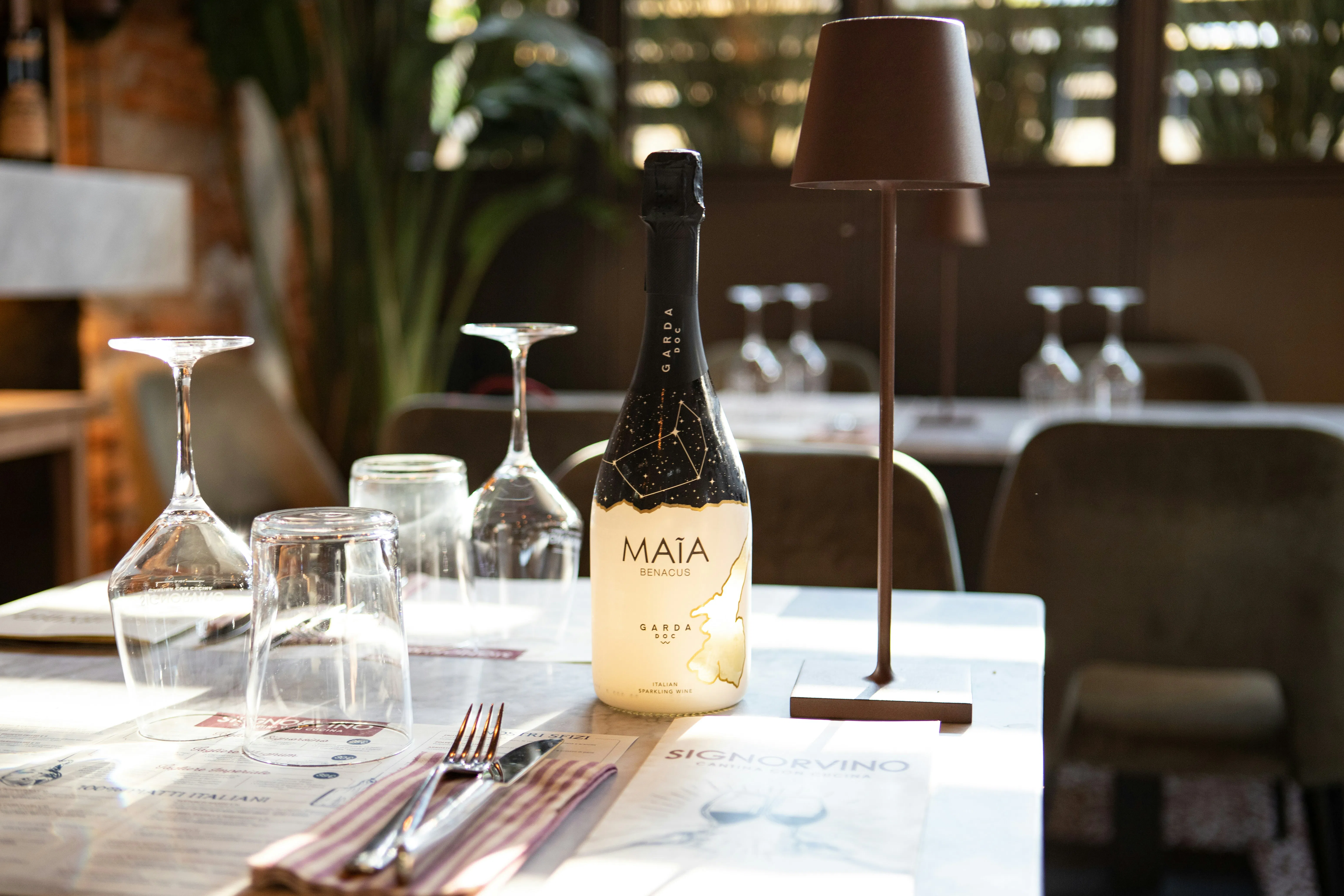 a bottle of wine sitting on top of a table