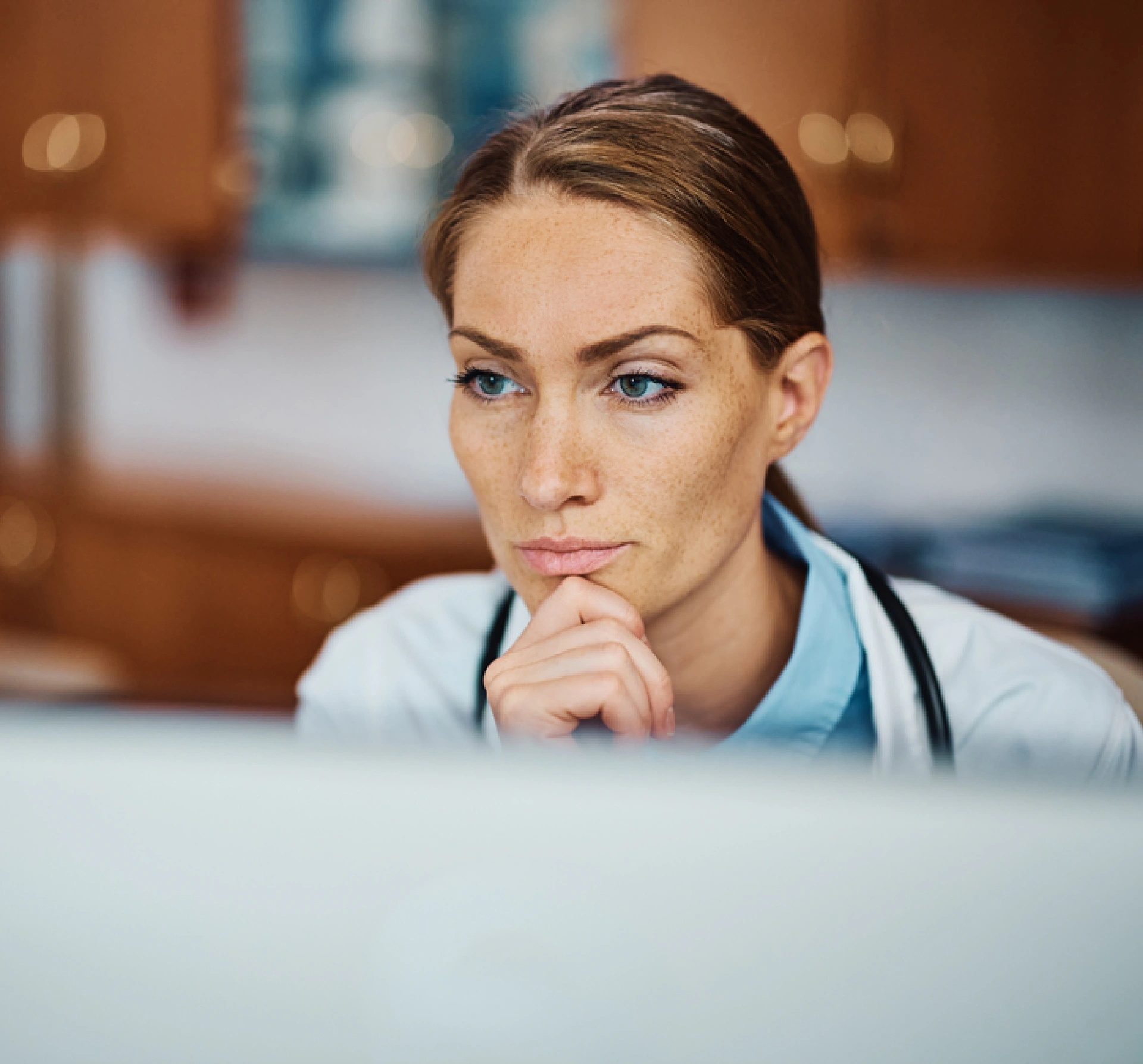 medical professional getting her CME credit on her laptop