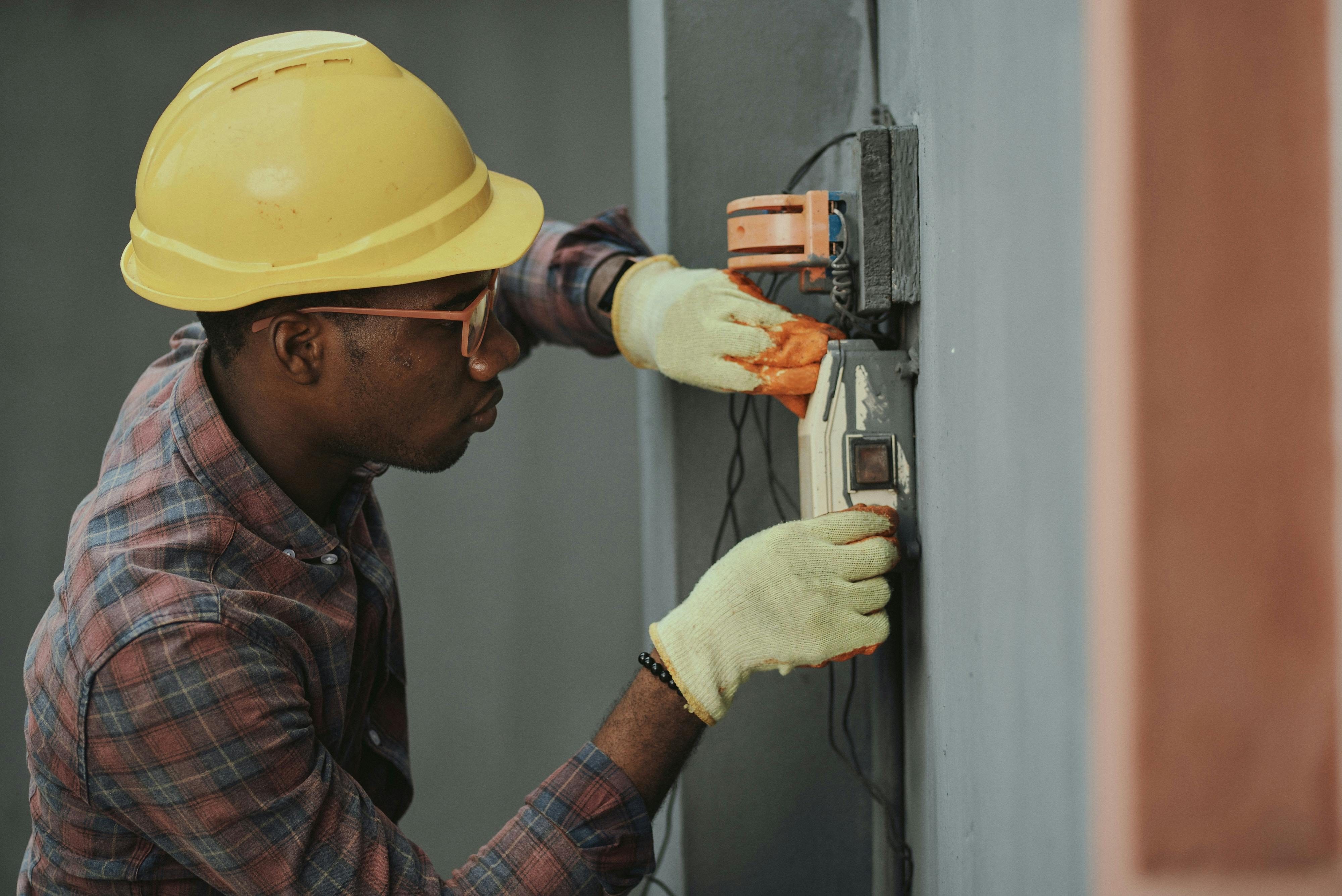 Home inspector testing electrical wiring