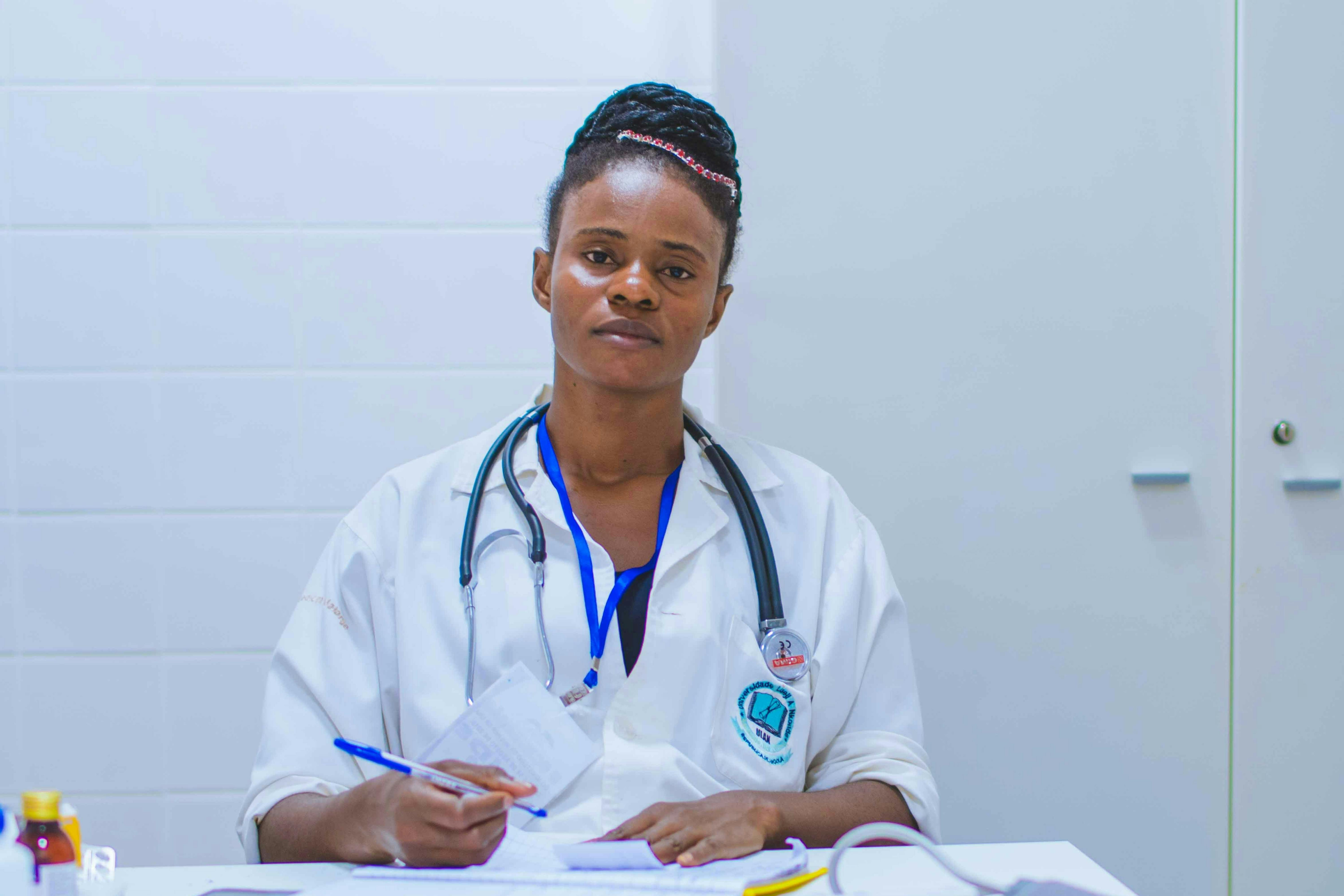 Nurse filling out paperwork