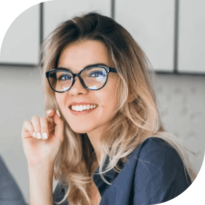 Woman smiling wearing glasses