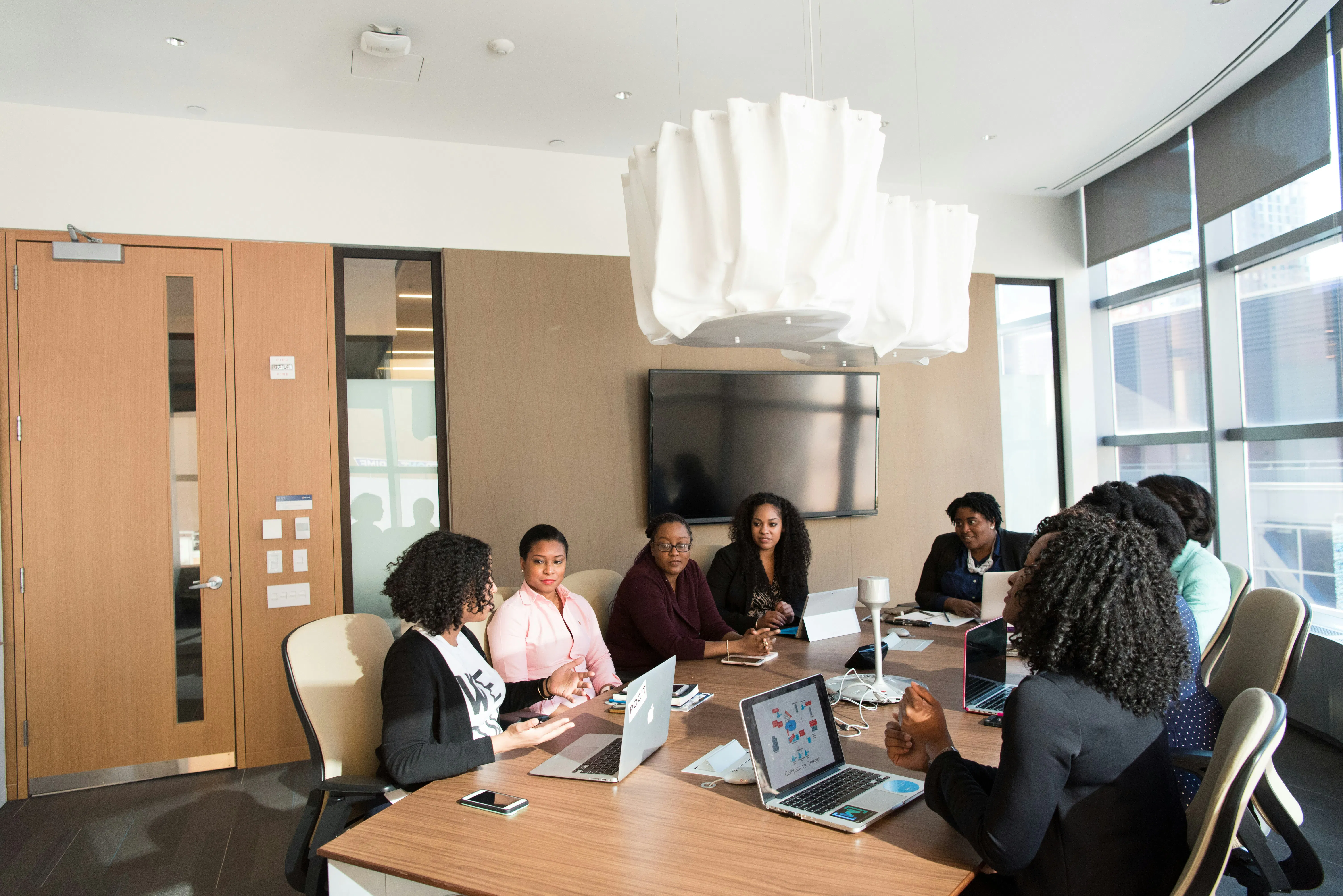 Business people sitting around a table during a meeting