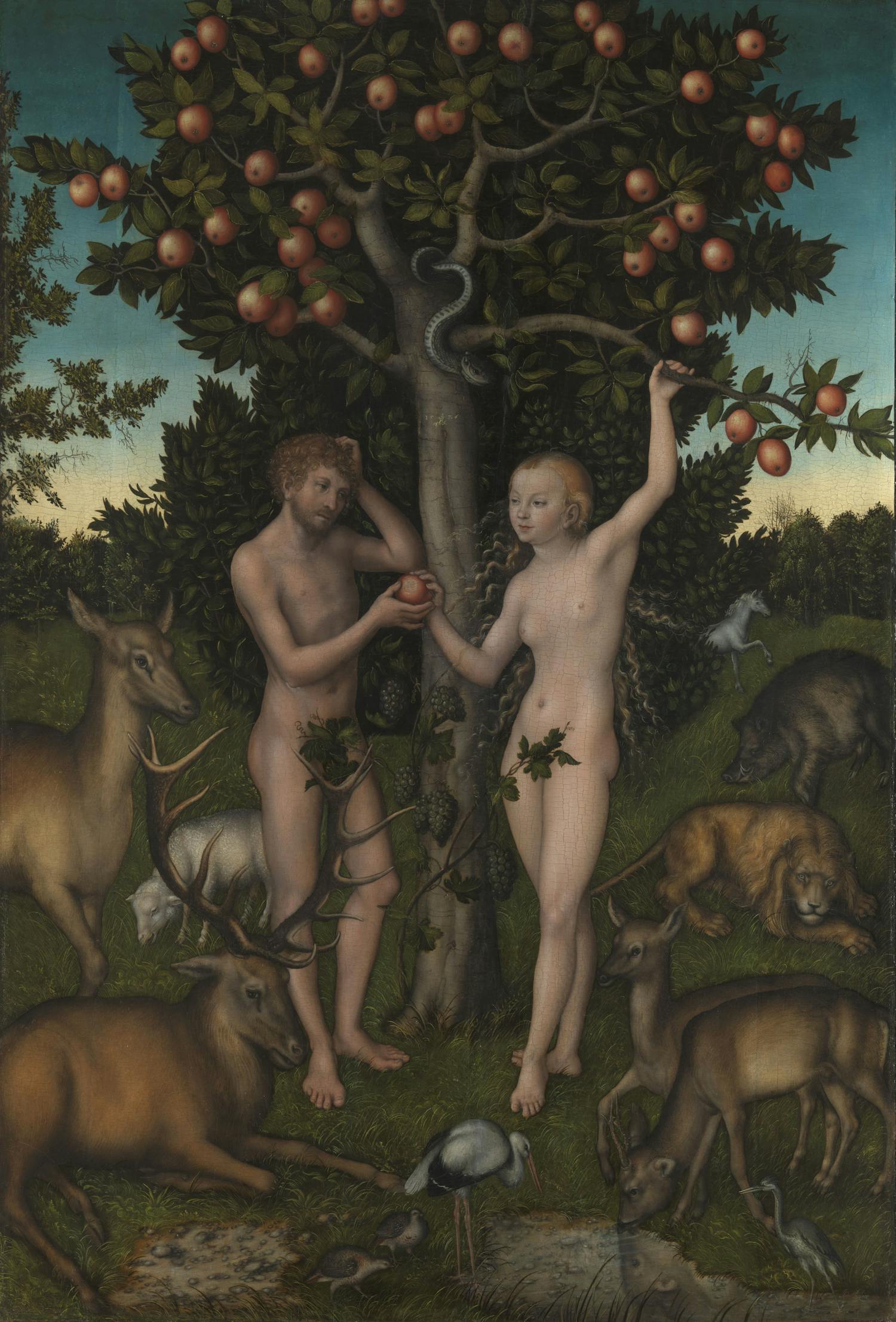 [ID: The work shows a man and a woman standing under an apple tree in the centre of the painting. They are surrounded by a group of deer, a sheep, a lion and a boar. A line of trees is shown in the horizon that is in the middle of the painting. End of ID]
