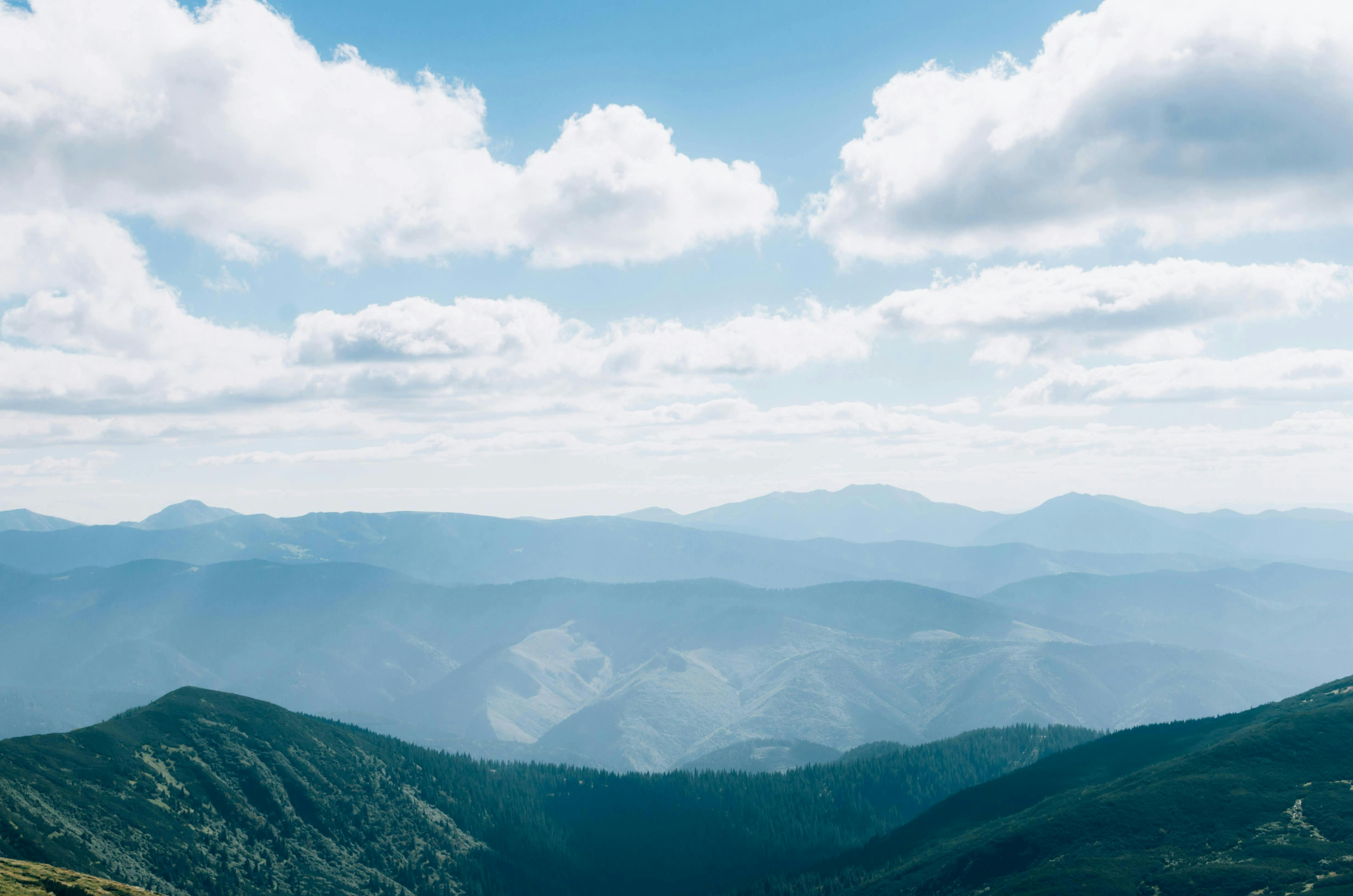 mountains and clouds in sky