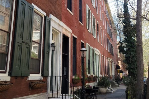 Historic Pine Street rowhouses in Philadelphia, showcasing a Passive House retrofit that combines energy efficiency with preserved architectural charm.