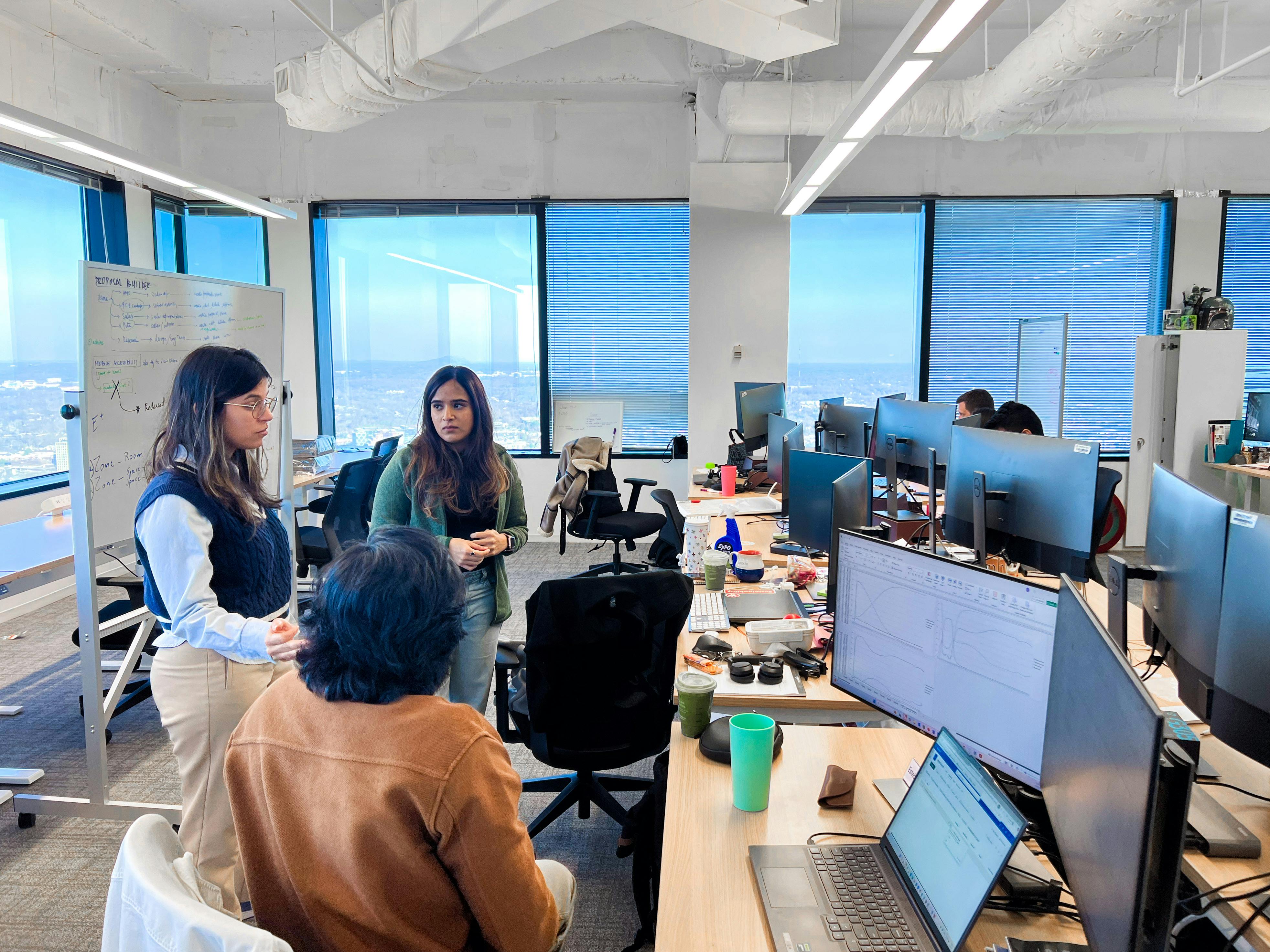 Marieclaire Monasterio and team of sustainability consultants review AI design